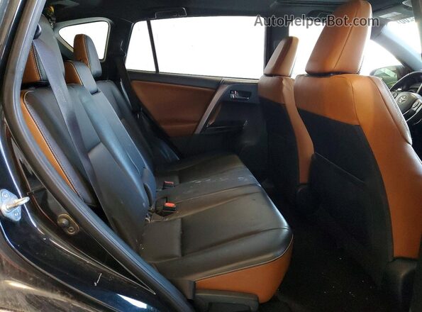 JTMJFREV2GJ065254 2016 TOYOTA RAV4 Black Rear seats view