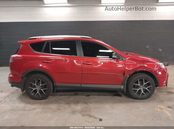 JTMJFREV2GJ082250 2016 TOYOTA RAV4 Red Rear interior view