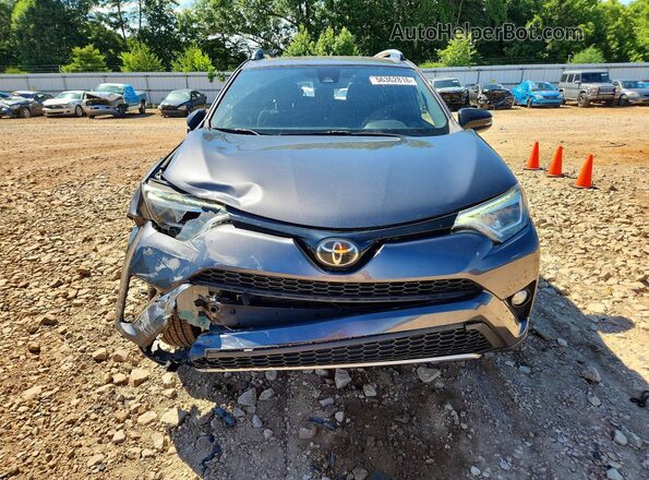 JTMJFREV3JJ216917 2018 TOYOTA RAV4 Gray Widok z przodu