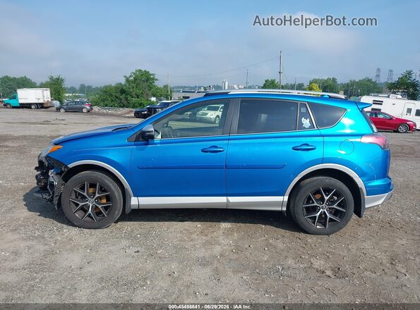 JTMJFREV5GD175682 2016 TOYOTA RAV4 Blue Vista interior trasera