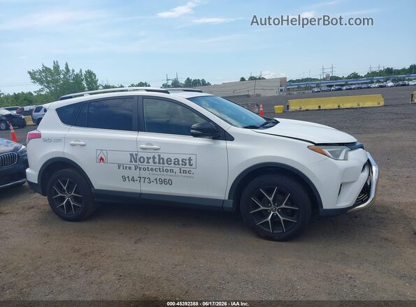 JTMJFREV5JJ719378 2018 TOYOTA RAV4 White Widok wnętrza z tyłu