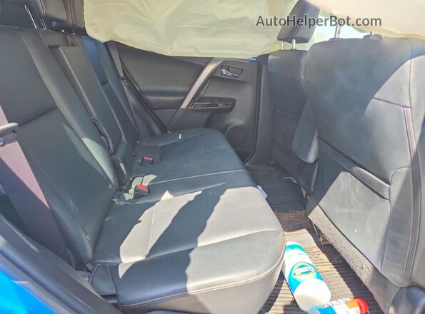 JTMJFREV6GD193723 2016 TOYOTA RAV4 Blue Vista interior trasera
