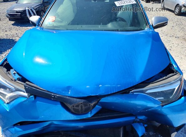 JTMJFREV6GD193723 2016 TOYOTA RAV4 Blue Vista del compartimento del motor