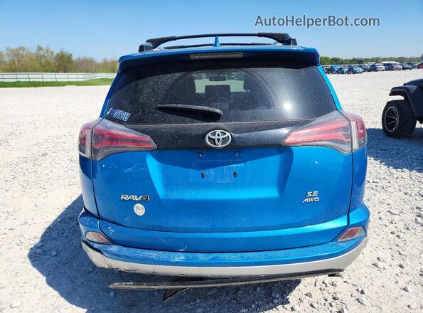 JTMJFREV6GD193723 2016 TOYOTA RAV4 Blue Vista trasera