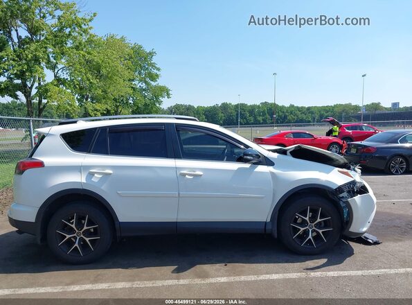JTMJFREV6JJ199000 2018 TOYOTA RAV4 White Սալոնի հետևի տեսք