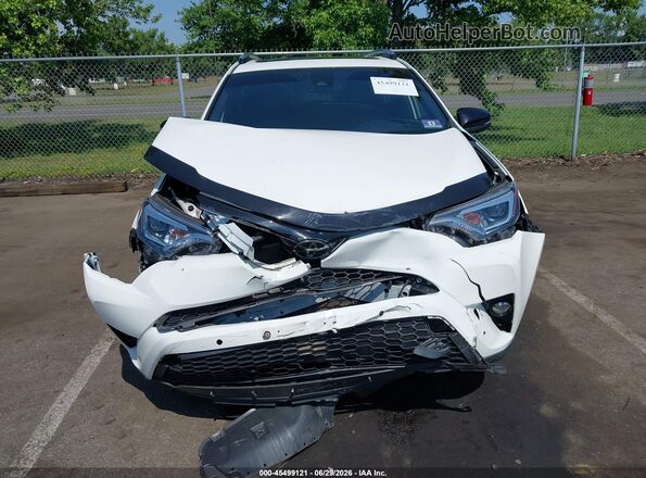JTMJFREV6JJ199000 2018 TOYOTA RAV4 White Սարքավորումների վահանակի տեսք