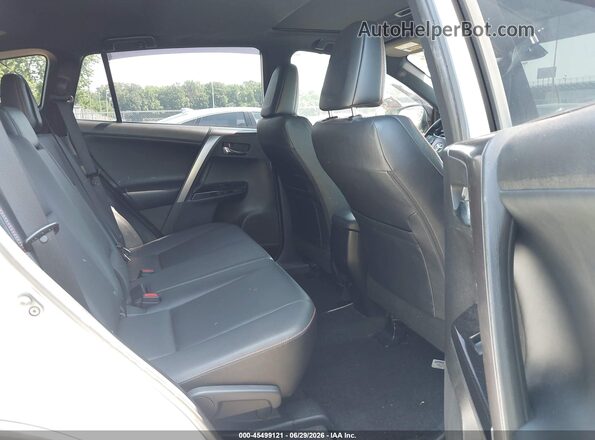JTMJFREV6JJ199000 2018 TOYOTA RAV4 White VIN կոդի պիտակի տեսք
