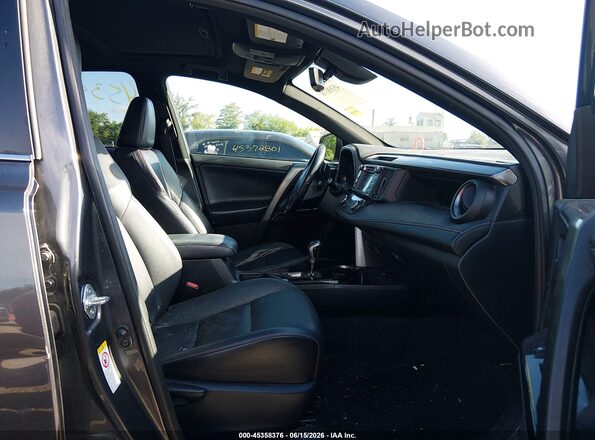 JTMJFREV8JJ730956 2018 TOYOTA RAV4 Gray Front interior view