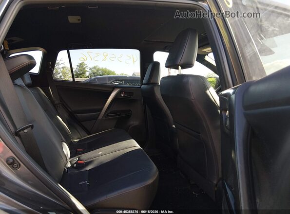 JTMJFREV8JJ730956 2018 TOYOTA RAV4 Gray VIN sticker view