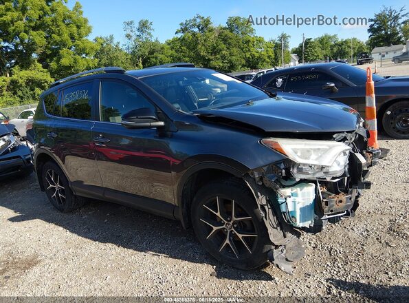JTMJFREV8JJ730956 2018 TOYOTA RAV4 Gray Rear interior view