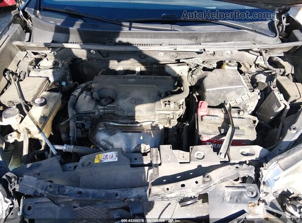 JTMJFREV8JJ730956 2018 TOYOTA RAV4 Gray Rear view