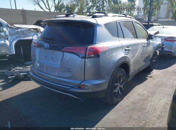 JTMJJREV1JD185759 2018 TOYOTA RAV4 HYBRID Silver 