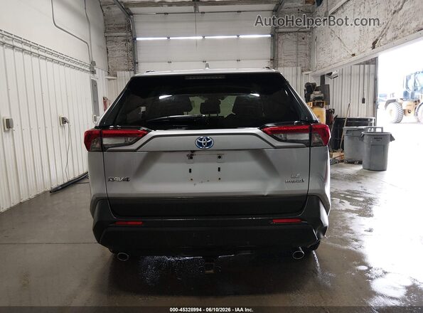 JTMLWRFV1KD013998 2019 TOYOTA RAV4 HYBRID Серебряный 