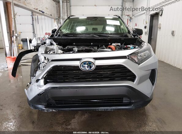 JTMLWRFV1KD013998 2019 TOYOTA RAV4 HYBRID Серебряный Вид задней части салона