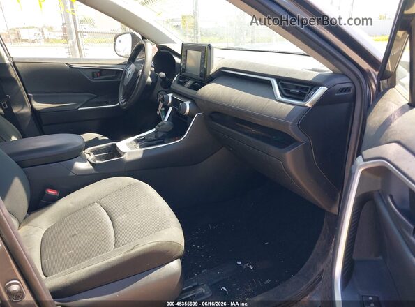 JTMMWRFV2KD034766 2019 TOYOTA RAV4 HYBRID Gray წინა სალონის ხედი