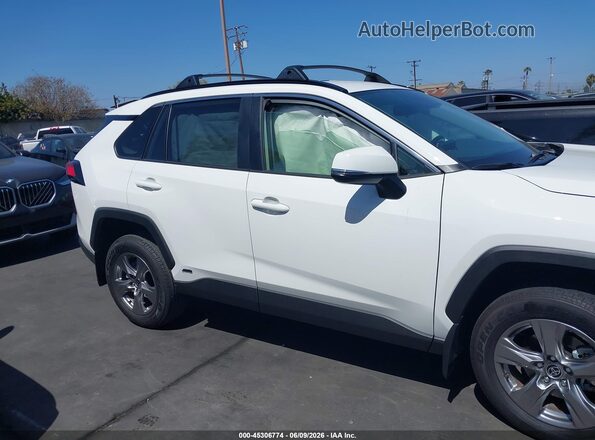 JTMMWRFV6SD310172 2025 TOYOTA RAV4 HYBRID White Vista interior trasera