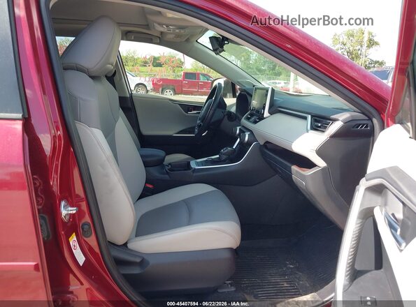 JTMN1RFV5KD517946 2019 TOYOTA RAV4 Maroon Vista interior delantera