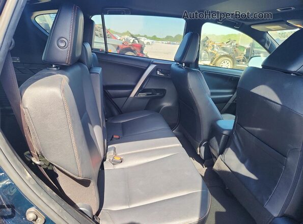 JTMNFREV0JD123112 2018 TOYOTA RAV4 Blue Rear seats view