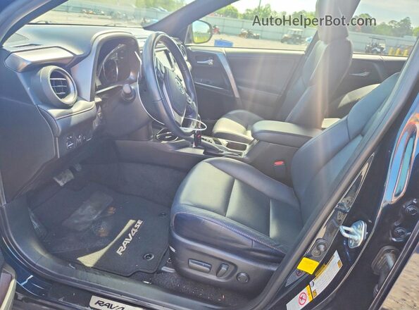 JTMNFREV0JD123112 2018 TOYOTA RAV4 Blue Front interior view