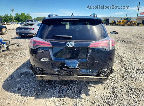 JTMNFREV0JD123112 2018 TOYOTA RAV4 Blue Rear view