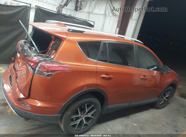 JTMNFREV3GJ063689 2016 TOYOTA RAV4 Orange Սալոնի հետևի տեսք