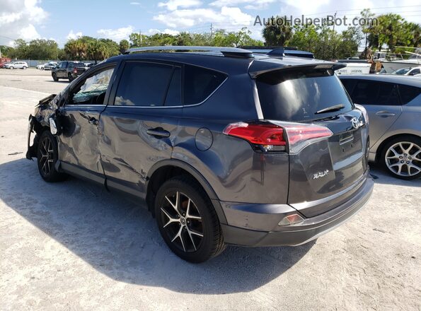 JTMNFREV8GJ077913 2016 TOYOTA RAV4 Gray 