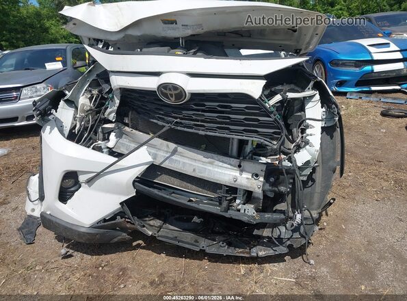 JTMP1RFV3KD002730 2019 TOYOTA RAV4 White Rear interior view