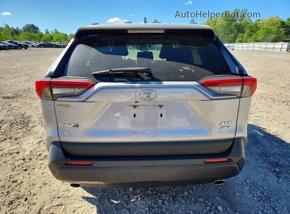 JTMP1RFV4KD512052 2019 TOYOTA RAV4 Silver Widok z tyłu
