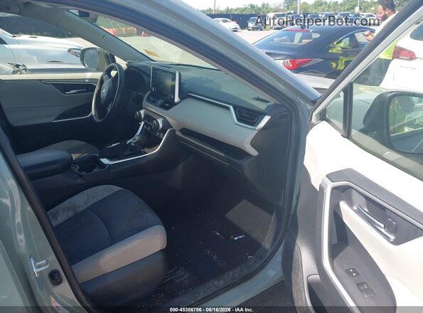 JTMP1RFV5KD016807 2019 TOYOTA RAV4 Gray Front interior view