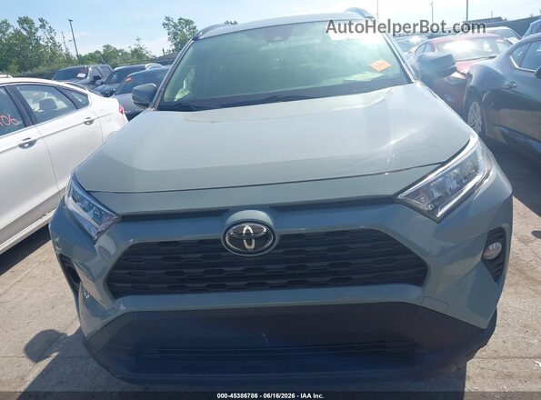 JTMP1RFV5KD016807 2019 TOYOTA RAV4 Gray Dashboard view