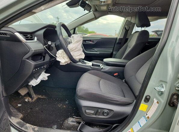 JTMP1RFV6KD506110 2019 TOYOTA RAV4 Green Front interior view