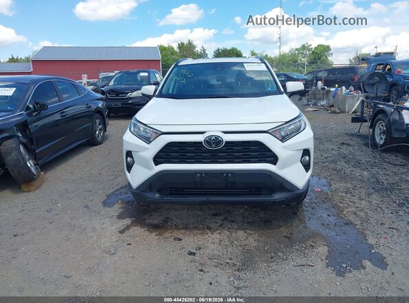 JTMP1RFV9KJ013524 2019 TOYOTA RAV4 White ხელსაწყოთა პანელის ხედი