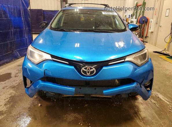 JTMRFREV0GJ085196 2016 TOYOTA RAV4 Blue Front view