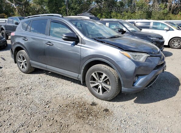 JTMRFREV0HD217759 2017 TOYOTA RAV4 Gray Front right