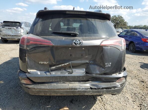 JTMRFREV0HD217759 2017 TOYOTA RAV4 Gray Rear view
