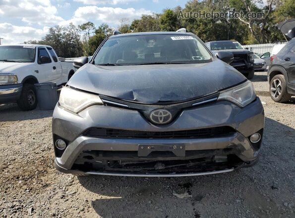 JTMRFREV0HD217759 2017 TOYOTA RAV4 Gray Front view