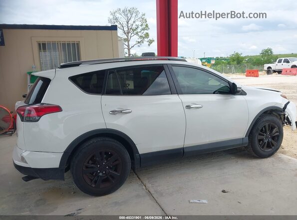 JTMRFREV0HJ113628 2017 TOYOTA RAV4 White Սալոնի հետևի տեսք