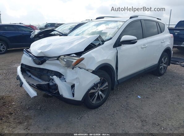 JTMRFREV0JJ746247 2018 TOYOTA RAV4 White Front left