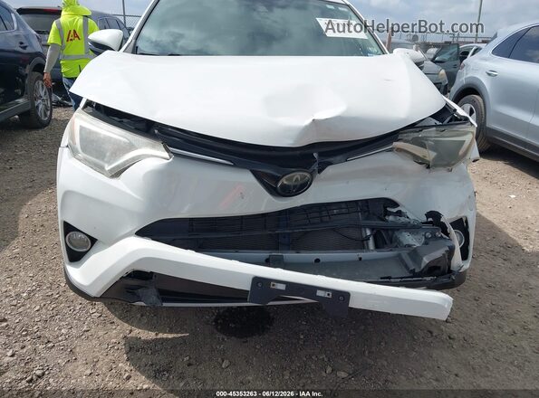 JTMRFREV0JJ746247 2018 TOYOTA RAV4 White Front view