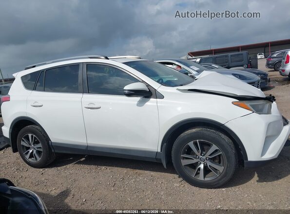 JTMRFREV0JJ746247 2018 TOYOTA RAV4 White Rear interior view