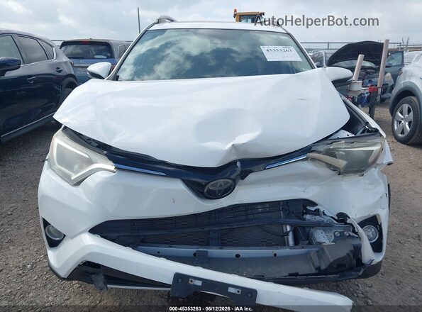 JTMRFREV0JJ746247 2018 TOYOTA RAV4 White Instrument cluster view
