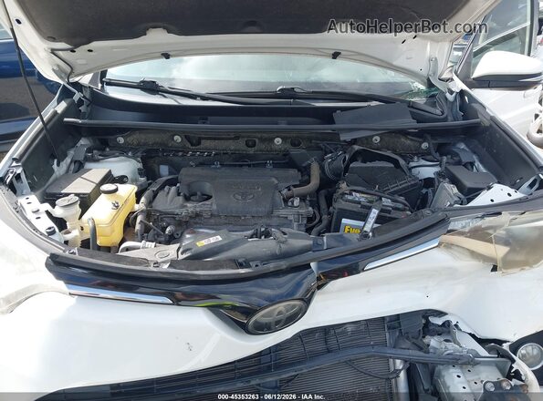 JTMRFREV0JJ746247 2018 TOYOTA RAV4 White Rear view
