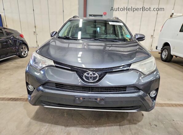 JTMRFREV1GD190344 2016 TOYOTA RAV4 Gray Front view