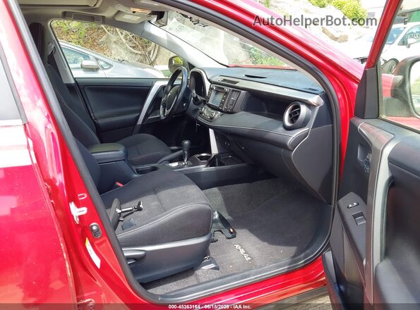 JTMRFREV1HJ112987 2017 TOYOTA RAV4 Red Front interior view