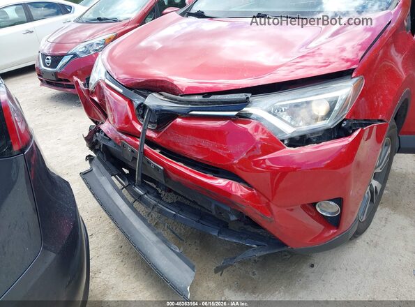 JTMRFREV1HJ112987 2017 TOYOTA RAV4 Red Front view
