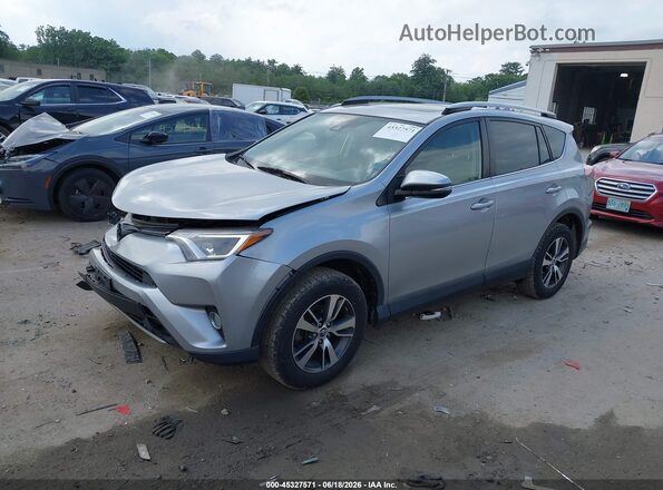 JTMRFREV1JJ248395 2018 TOYOTA RAV4 Silver Przód lewy