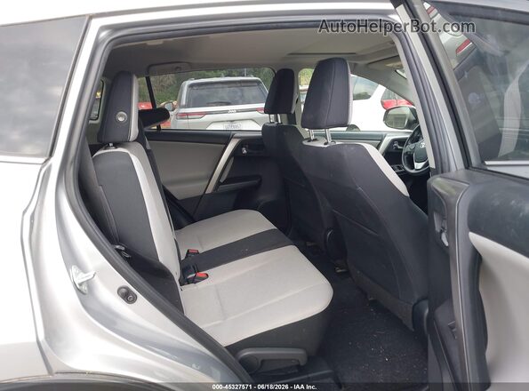 JTMRFREV1JJ248395 2018 TOYOTA RAV4 Silver Widok naklejki z numerem VIN