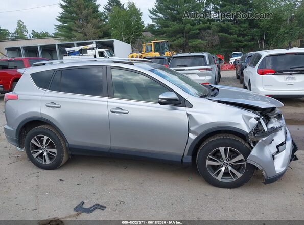 JTMRFREV1JJ248395 2018 TOYOTA RAV4 Silver Widok wnętrza z tyłu