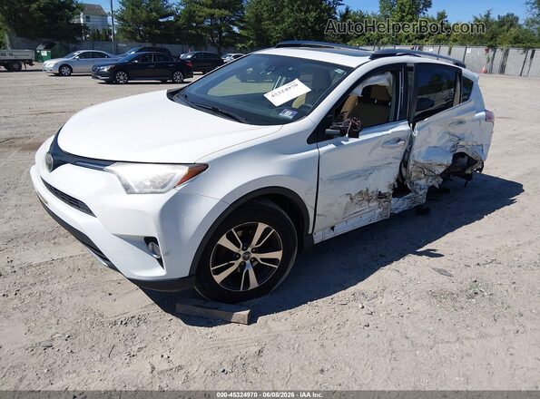JTMRFREV2HJ105983 2017 TOYOTA RAV4 White Przód lewy
