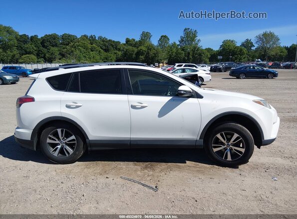 JTMRFREV2HJ105983 2017 TOYOTA RAV4 White Widok wnętrza z tyłu